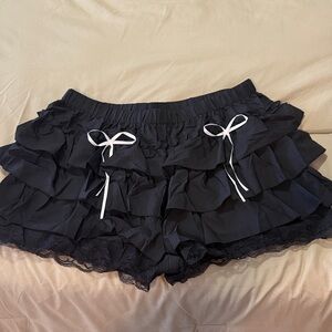 Black Ruffled Shorts with White Bows